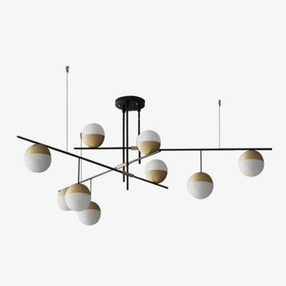 Lustre design avec branches et boules en verre et métal doré