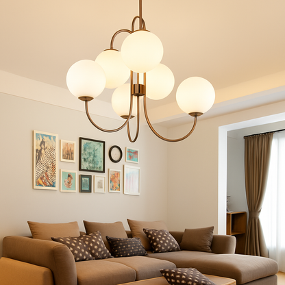 Lustre design avec branches dorées et boule de verre