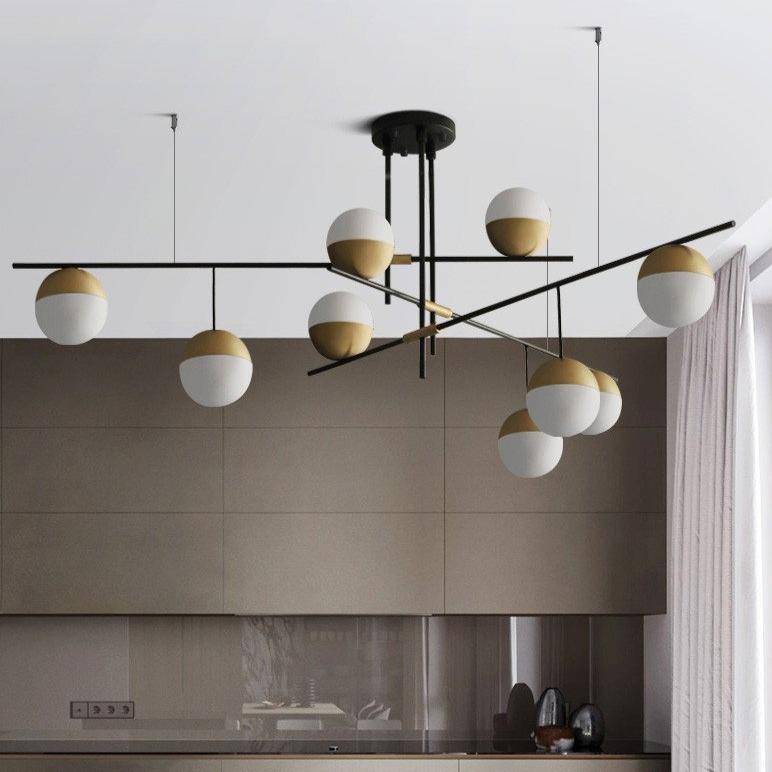 Lustre design avec branches et boules en verre et métal doré